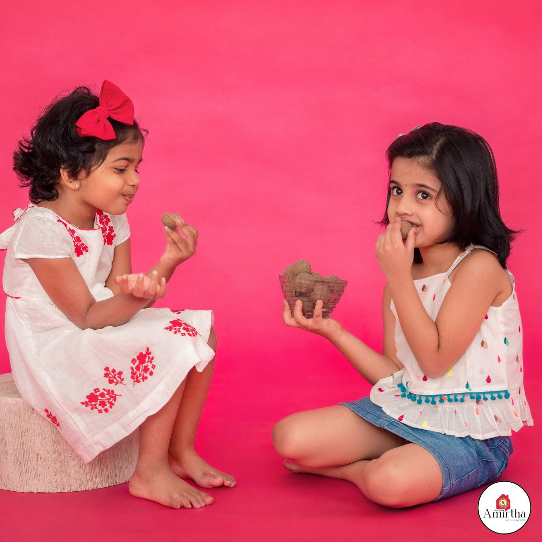 Sesame & Foxtail Millet Power Ladoos - Amirtha Health Foods